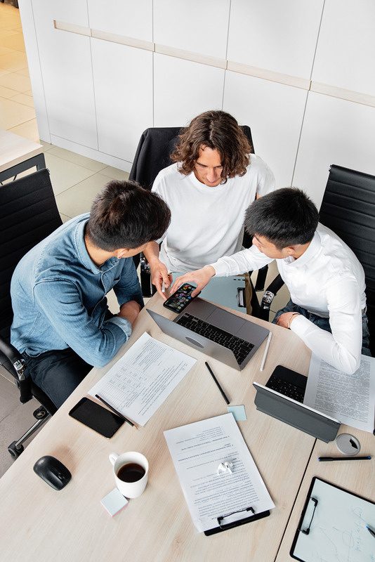 Infinity Edge advisors reviewing a client's property options